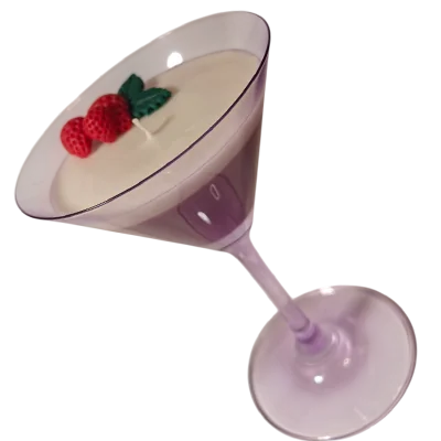 A candle styled as a glass on the counter