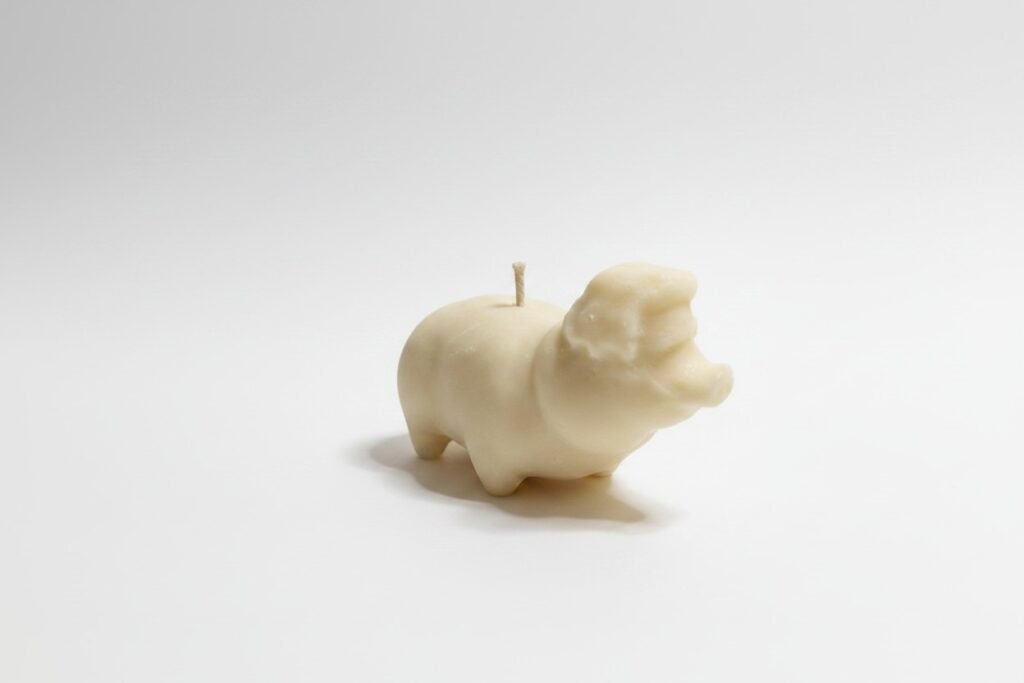 Nikita 2.0: Nikita Ate (retirement era) white chocolate edible candle