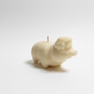 Nikita 2.0: Nikita Ate (retirement era) white chocolate edible candle